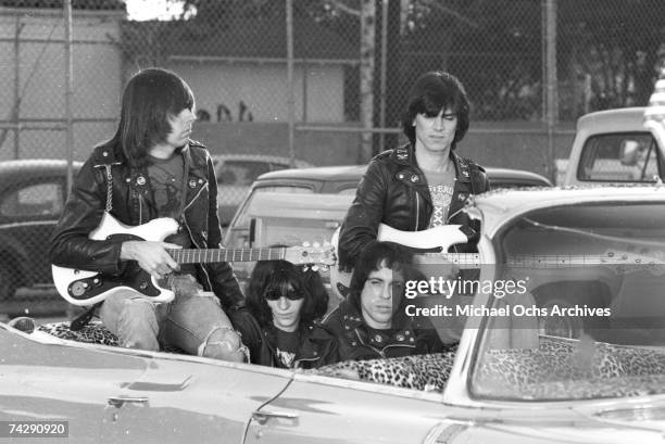 Left to right Johnny Ramone, Joey Ramone , Marky Ramone , Dee Dee Ramone , and driver Rodney Bingenheimer punk group The Ramones rides in a vintage...