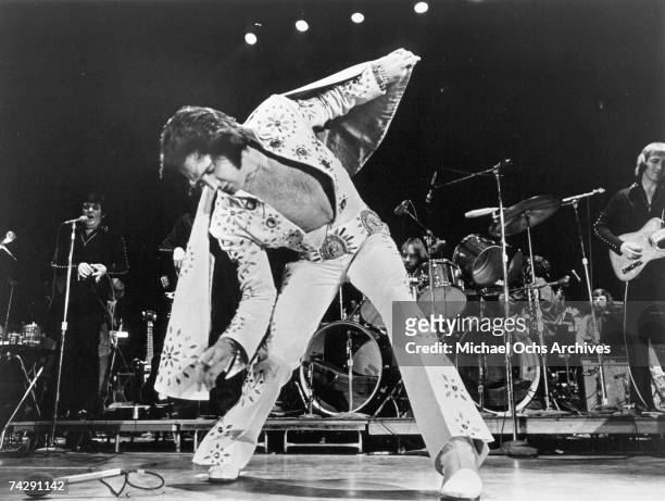 Rock and roll singer Elvis Presley performs on stage in 1972.