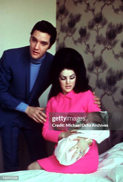 Rock and roll singer Elvis Presley with his wife Patricia Beaulieu Presley and their newborn daughter Lisa Marie Presley February 1, 1968 in Memphis,...