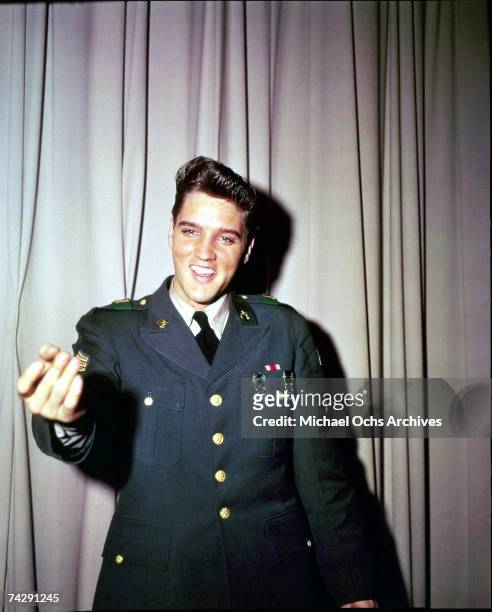 Rock and roll singer Elvis Presley poses for a portrait during his tour of duty in Germany in February of 1959.