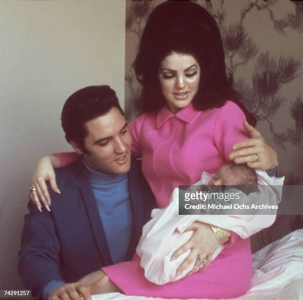 Rock and roll singer Elvis Presley with his wife Priscilla Beaulieu Presley and their 4 day old daughter Lisa Marie Presley on February 5, 1968 in...