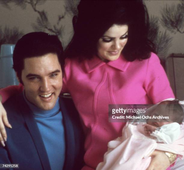 Rock and roll singer Elvis Presley with his wife Priscilla Beaulieu Presley and their 4 day old daughter Lisa Marie Presley on February 5, 1968 in...