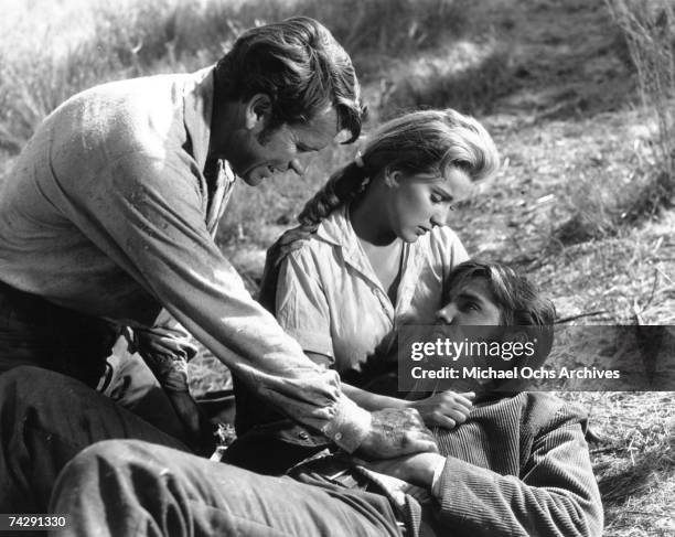 Malibu CA Elvis Presley with Debra Paget and Richard Egan on the set of "Love Me Tender in August 1956 at the 20th Century Fox Ranch, Malibu Creek...