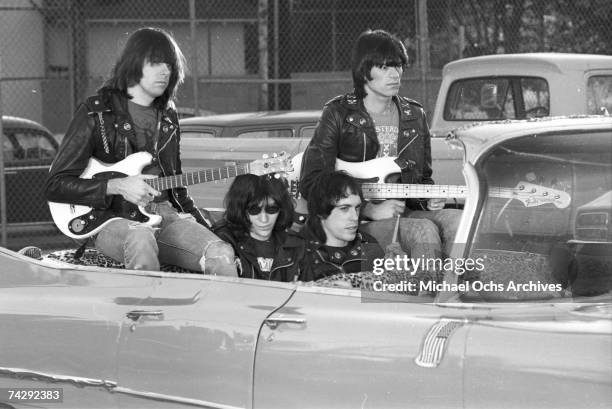 Left to right Johnny Ramone, Joey Ramone , Marky Ramone , Dee Dee Ramone , and driver Rodney Bingenheimer punk group The Ramones rides in a vintage...