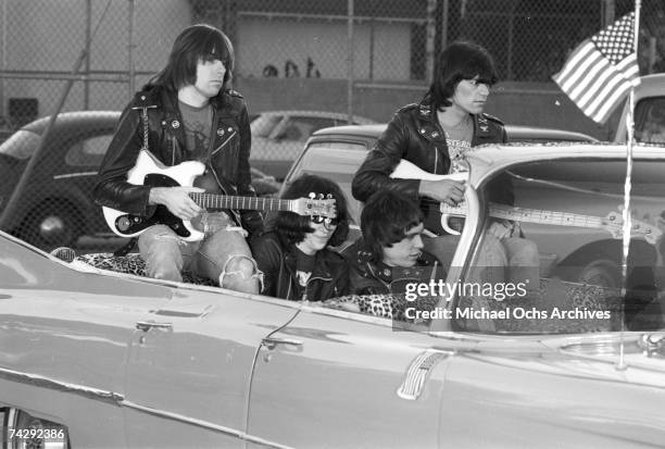 Left to right Johnny Ramone, Joey Ramone , Marky Ramone , Dee Dee Ramone , and driver Rodney Bingenheimer punk group The Ramones rides in a vintage...