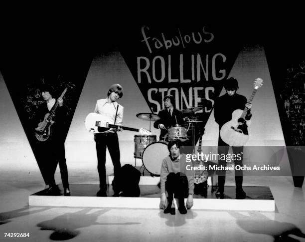 Rock and roll band "The Rolling Stones" Bill Wyman, Brian Jones, Charlie Watts, Mick Jagger and Keith Richards rehearse for an appearance on a...