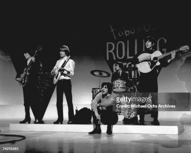 Rock and roll band "The Rolling Stones" Bill Wyman, Brian Jones, Charlie Watts, Mick Jagger and Keith Richards rehearse for an appearance on a...
