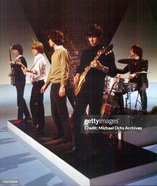 Rock and roll band "The Rolling Stones" perform on a TV show in 1965 in London, England.