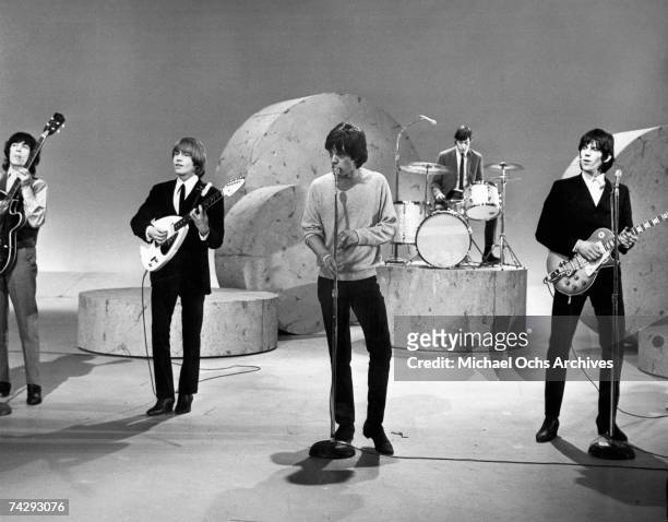 Rock and roll band "The Rolling Stones" perform on the Ed Sullivan Show on October 25, 1964 in New York City, New York. Bill Wyman, Brian Jones, Mick...