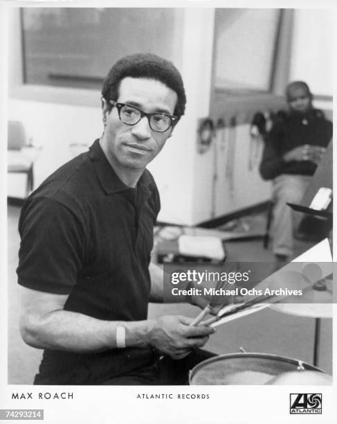 Jazz Drummer Max Roach looks over some sheet music in the studio in circa 1965.