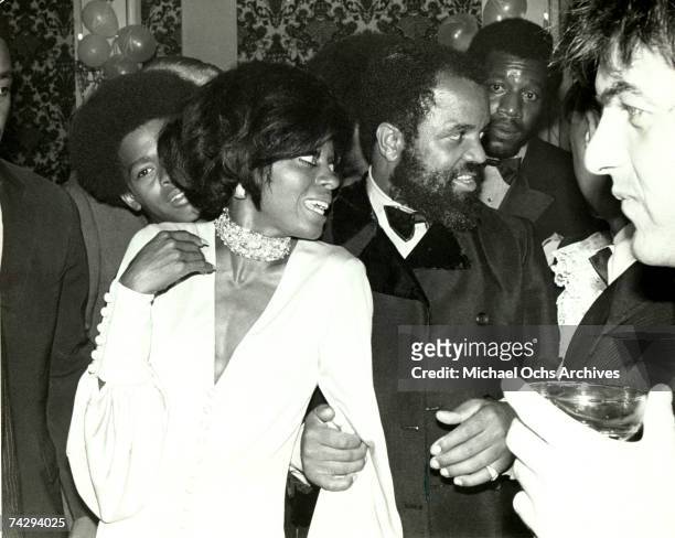 American record executive, Berry Gordy of Motown records with singer Diana Ross, circa 1975.