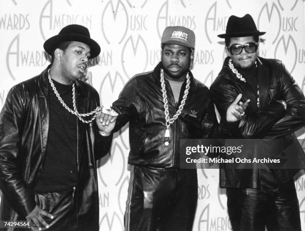 Reverend Run, Jam Master Jay and Darryl McDaniels of the hip hop group "Run DMC" pose for a portrait backstage at the American Music Awards at the...