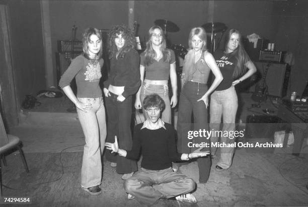 Rock band "The Runaways" pose for a portrait with their producer Kim Fowley in Los Angeles in 1975. Joan Jett, Peggy Foster, Sandy West, Cherie...