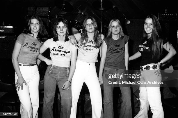 Jackie Fox, Joan Jett, Sandy West, Cherie Currie and Lita Ford of the rock band 'The Runaways' pose for a portrait at Boomer's in Santa Monica,...