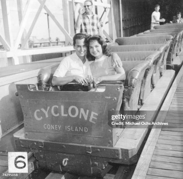 Singer Neil Sedaka and his then girlfriend Leba Strassberg whom he would later marry spend a romantic day going to Coney Island, playing music, going...