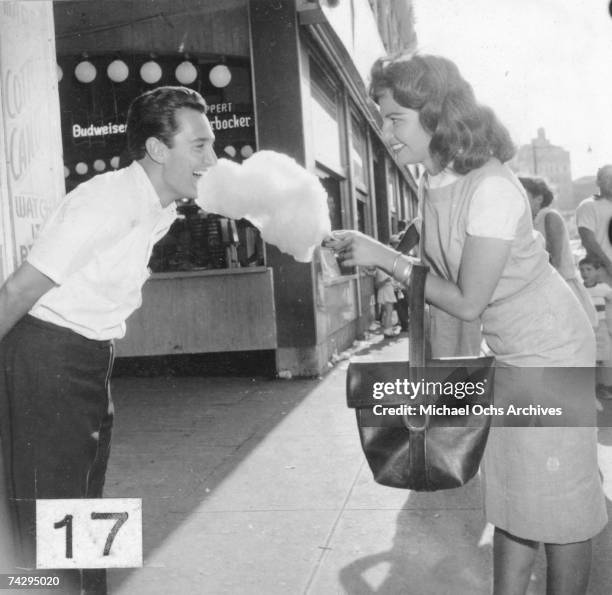 Singer Neil Sedaka and his then girlfriend Leba Strassberg whom he would later marry spend a romantic day going to Coney Island, playing music, going...