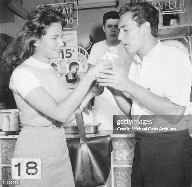 Singer Neil Sedaka and his then girlfriend Leba Strassberg whom he would later marry spend a romantic day going to Coney Island, playing music, going...