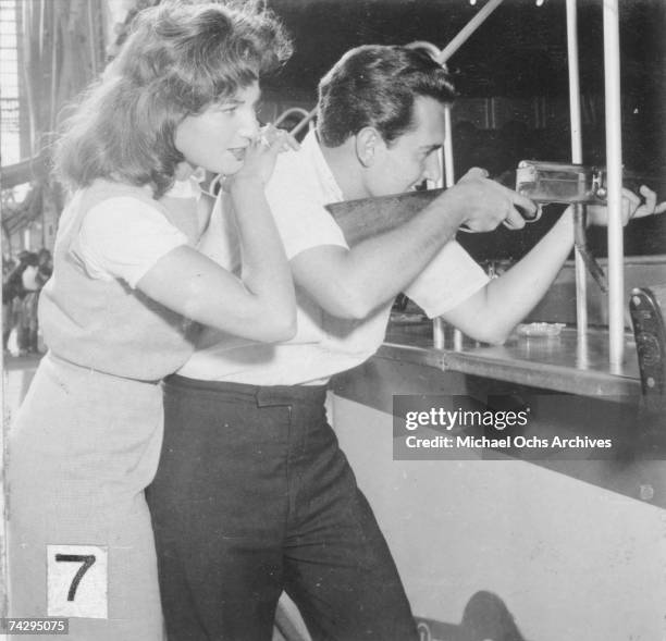 Singer Neil Sedaka and his then girlfriend Leba Strassberg whom he would later marry spend a romantic day going to Coney Island, playing music, going...