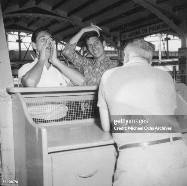 Singer Neil Sedaka and his then girlfriend Leba Strassberg whom he would later marry spend a romantic day going to Coney Island, playing music, going...