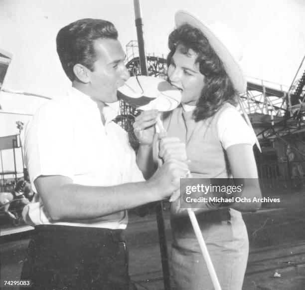 Singer Neil Sedaka and his then girlfriend Leba Strassberg whom he would later marry spend a romantic day going to Coney Island, playing music, going...