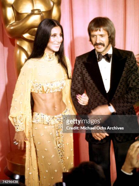 Entertainers Sonny Bono and Cher attend the Academy Awards ceremony at the Dorothy Chandler Pavilion on March 27, 1973 in Los Angeles, California.