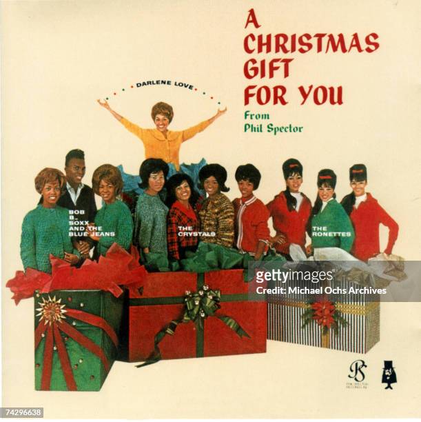 Christmas Gift For You" from Phil Spector album cover featuring Bobb B. Soxx and The Blue Jeans, Darlene Love, The Crystals, and The Ronettes which...