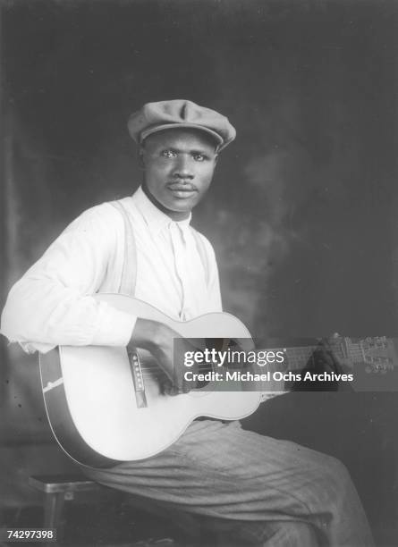 Blues Musician Frank Stokes poses with a Martin 00-28 guitar circa 1925 in Memphis, Tennessee.