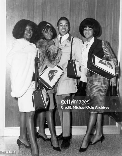 Singers Mary Wilson, Diana Ross and Florence Ballard of the R&B vocal group "The Supremes" pose for a portrait with fellow Tamla Motown artist Smokey...