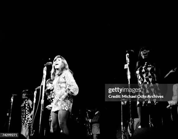 Tina Turner of the husband-and-wife R&B duo Ike & Tina Turner performs onstage with their back-up dancers "The Ikettes" on January 21, 1969.