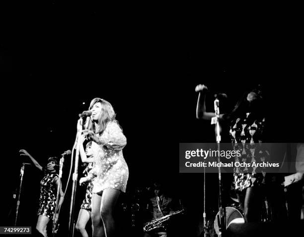 Tina Turner of the husband-and-wife R&B duo Ike & Tina Turner performs onstage with their back-up dancers "The Ikettes" on January 21, 1969.