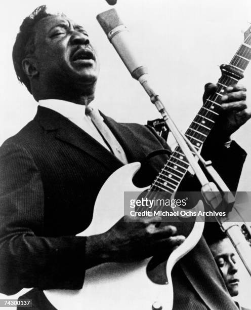 Blues man Muddy Waters performing with a Gibson SG electric guitar in circa 1969. Photo by Michael Ochs Archives/Getty Images