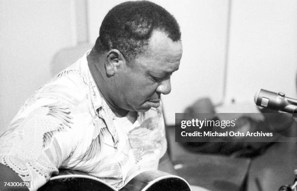 Bluesman Big Joe Williams plays guitar in the syudio while recording Lightnin' Hopkins' album 'Penitentiary Blues' on July 1960 in Los Angeles,...