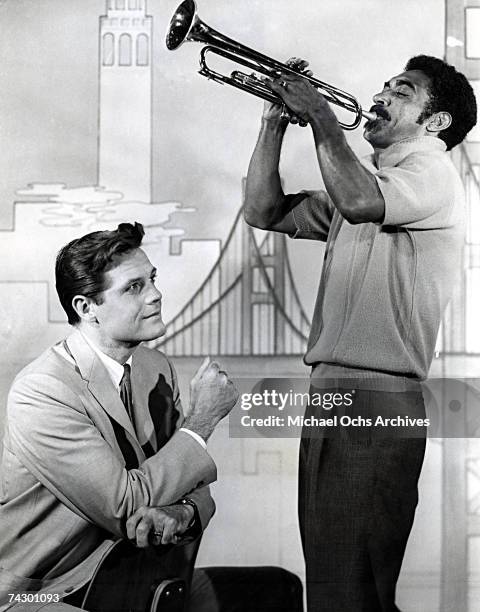 Jazz trumpeter Gerald Wilson and actor Jack Lord pose for a publicity still circa 1967.