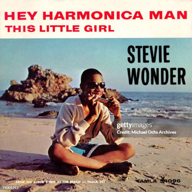 Stevie Wonder "Hey Harmonica Man" & This Little Girl Album Cover onn the beach which was released in 1964. Photo by Michael Ochs Archives/Getty Images