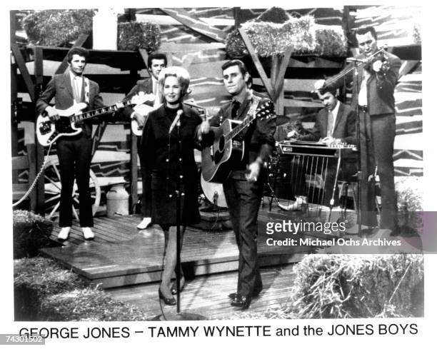 Tammy Wynette & George Jones Performing on stage with the Jones Boys in circa 1972.