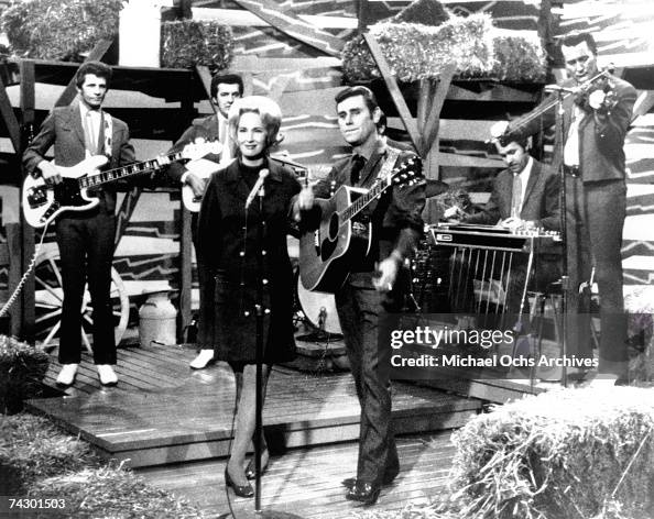 Tammy Wynette And George Jones Performing Onstage with the Jones Boys Tammy Wynette And George Jones Performing Onstage with the Jones Boys