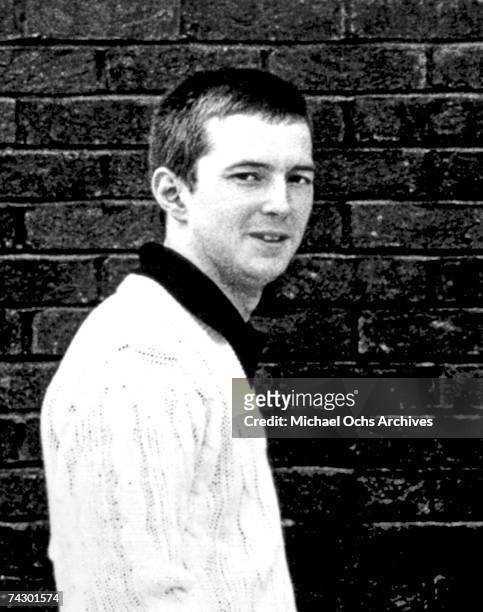 Rock and roll guitarist Eric Clapton poses for a portrait during his time with the band "The Yardbirds" in 1964 in England.