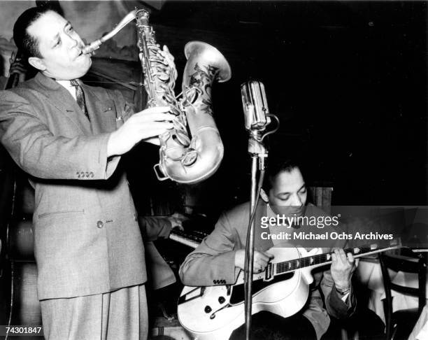 View of American Jazz musician Lester Young as he performs, with others, onstage, 1940s or 1950s. (Photo by Michael Ochs Archives/Getty Images