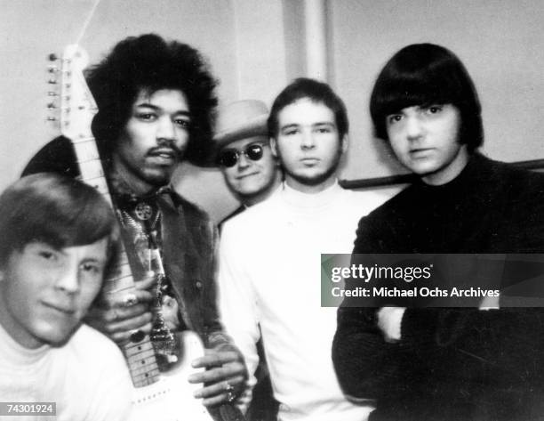 Rock band "ZZ Top" formerly "The Moving Sidewalks" poses for a portrait with rock guitarist Jimi Hendrix whom they opened for at the Municipal...