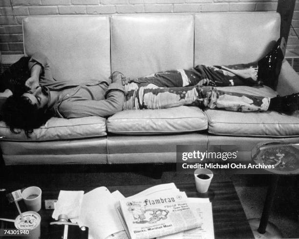 Rock and roll guitarist Frank Zappa lies down on a sofa in 1968 in Los Angeles, California.