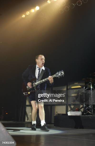 Angus Young and AC/DC perform at The Roseland Ballroom on March 11, 2003 in New York City.