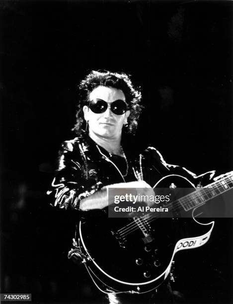 Bono and U2 perform on their "Zoo TV" tour at Giants Stadium on August 12, 1992 in East Rutherford, New Jersey.