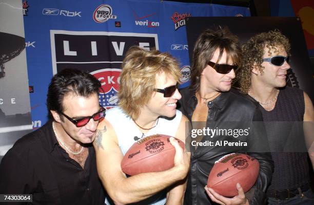 Hard rock group "Bon Jovi" hold a press conference during NFL Kickoff Weekend at the Marriot Marquis hotel in Times Square on September 5, 2002 in...