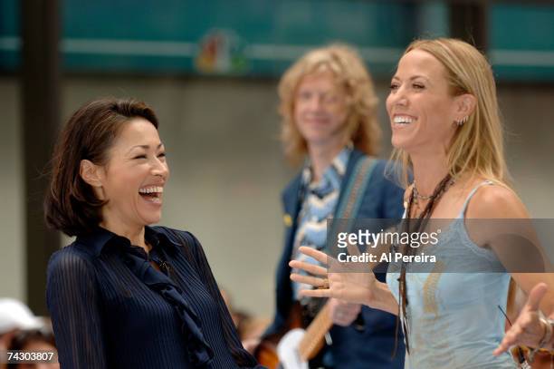 Singer and songwriter Sheryl Crow chats with host Ann Curry on the Today show in Rockefeller Plaza on July 12, 2006 in New York, New York.