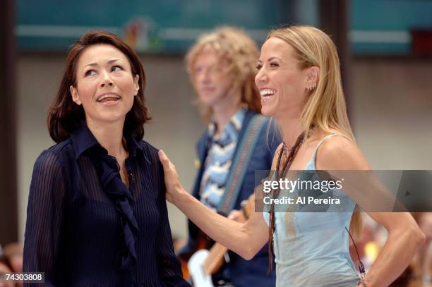 Singer and songwriter Sheryl Crow chats with host Ann Curry on the Today show in Rockefeller Plaza on July 12, 2006 in New York, New York.