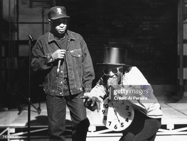 Rappers Chuck D and Flavor Flav of the rap group 'Public Enemy' perform onstage in circa 1988 in New York, New York.