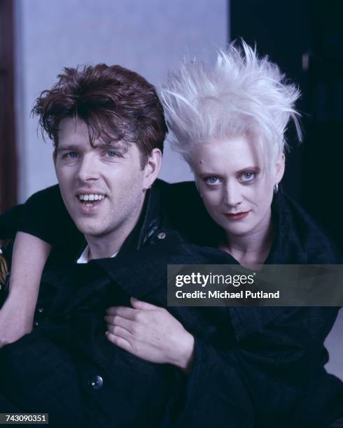 Singer and bassist Tom Bailey, and drummer Alannah Currie of British pop group the Thompson Twins, pictured together on 5th May 1987.