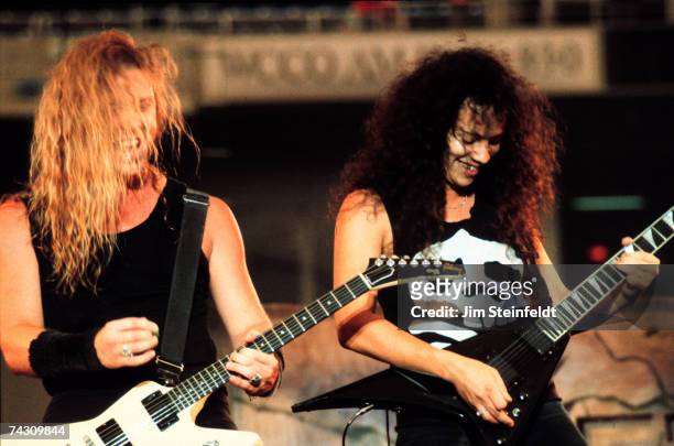 Guitarists James Hetfield and Kirk Hammett of the heavy metal quartet Metallica performs onstage in 1988 in Minneapolis, Minnesota.