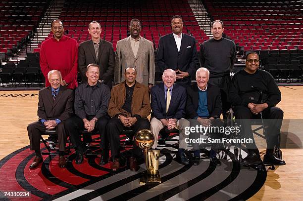 Former Portland Trail Blazer Lionel Hollins poses with his then teammates during a photo shoot at the Rose Garden Arena in Portland, Oregon. The...