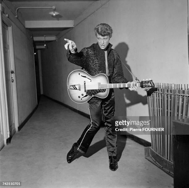 French singer Johnny Hallyday backstage at the Alhambra music hall in Paris, 16th September 1960.